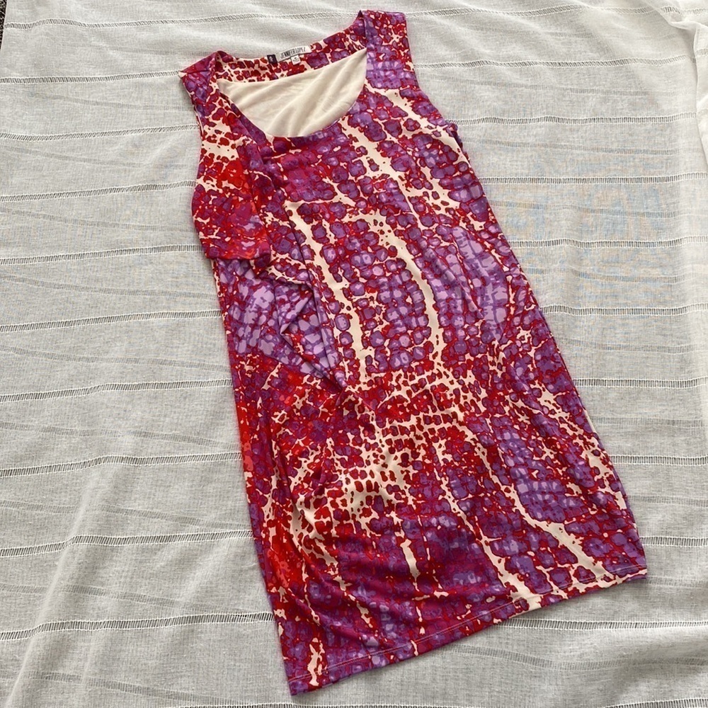 Jennifer Lopez snake print sleeveless mini shift dress.